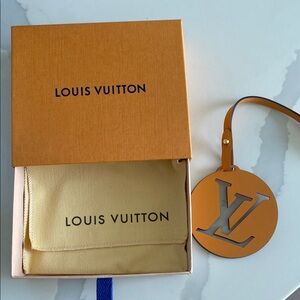 Louis Vuitton Tangerine leather Round Tag - authentic